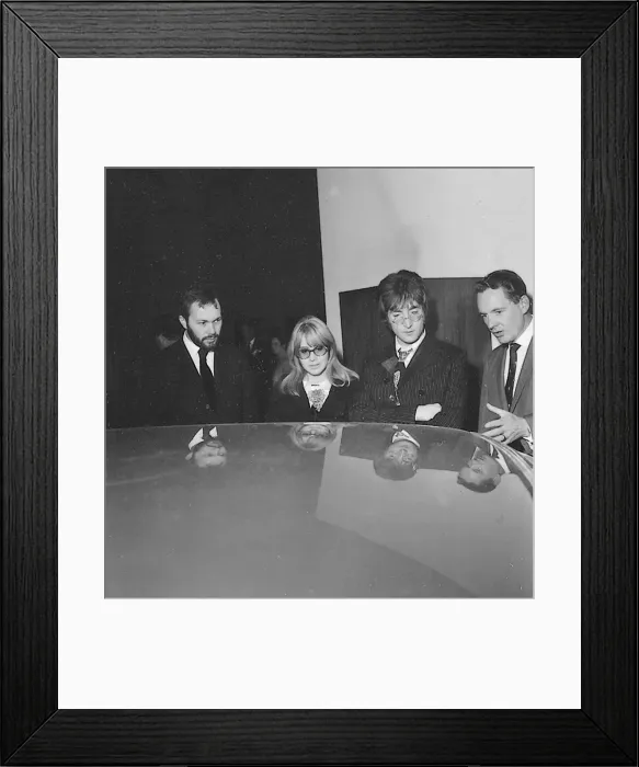Framed Print : The Beatles, 1967. John Lennon with wife Cynthia at London motor show Framed Print : The Beatles, 1967. John Lennon with wife Cynthia at London motor show