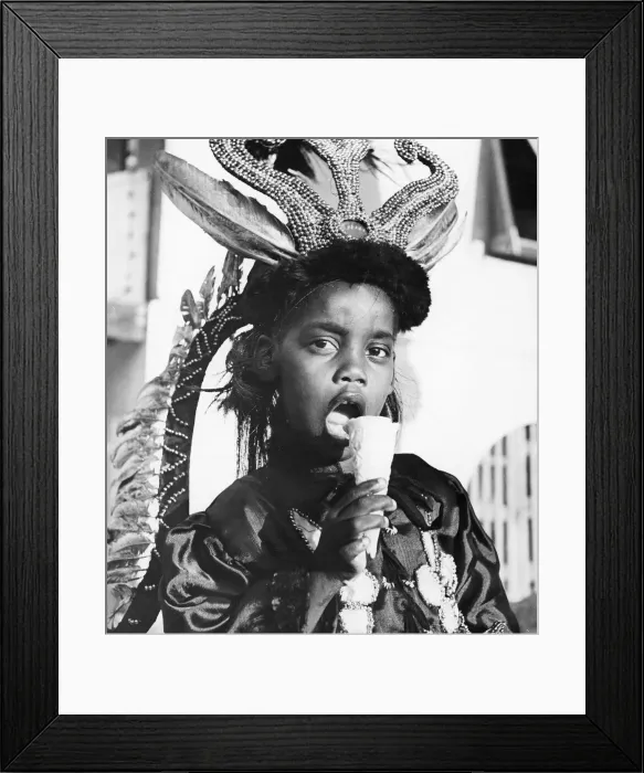 Framed Print : Childrens Carnival in Port of Spain, Trinidad. One of the local children seen here Framed Print : Childrens Carnival in Port of Spain, Trinidad. One of the local children seen here