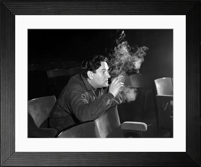 Framed Print : Wolf Mankowitz sitting in the stalls watching rehearsals for his musical