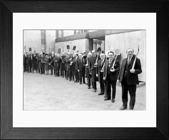 Framed Print : Unusual  /  Men  /  Marching: Garden Spades'on parade in the city