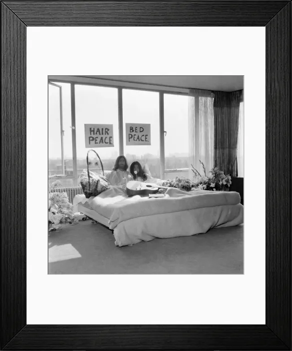 Framed Print : John Lennon and his wife Yoko Ono are having a weeks love-in their room at the Hilton