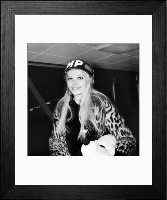 Framed Print : Miss World, Eva Rueber-Staier wearing the U. S. helmet pictured at Heathrow