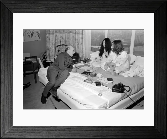 Framed Print : Pictured on their honeymoon'bed newly weds. John Lennon