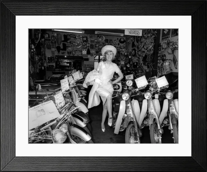 Framed Print : Model Rene at her shop. Motor-cycling is in her blood. June 1966 P004907 Framed Print : Model Rene at her shop. Motor-cycling is in her blood. June 1966 P004907