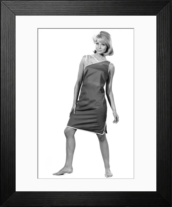 Framed Print : Reveille Fashions: Marilyn Rickard modelling sleeveless summer dress. August 1966 P006617 Framed Print : Reveille Fashions: Marilyn Rickard modelling sleeveless summer dress. August 1966 P006617