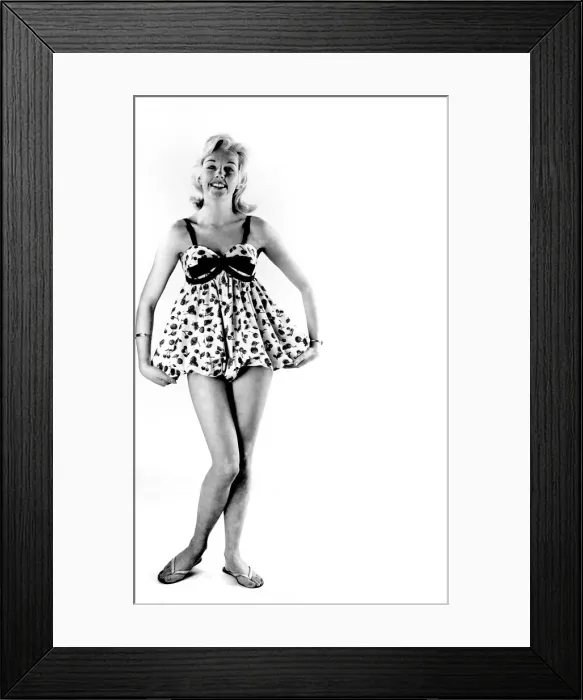 Framed Print : Reveille Fashions. Mannequin modelling a short length night dress. March 1959 P006933 Framed Print : Reveille Fashions. Mannequin modelling a short length night dress. March 1959 P006933