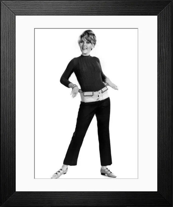 Framed Print : Reveille Fashions 1966: Delia Freeman modelling trouser suit. November 1966 P006594 Framed Print : Reveille Fashions 1966: Delia Freeman modelling trouser suit. November 1966 P006594