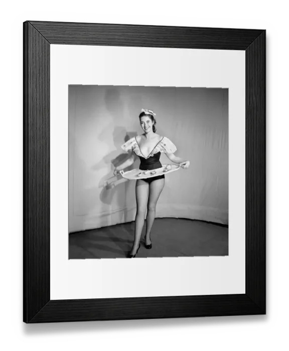 Framed Print : Woman wearing a skirt that is also a tray, seen here with tea pot and cups on the tray