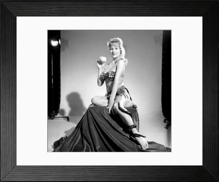 Framed Print : Model Carol Gardener as Eve about to take a bite from the apple. 1960 E421-014 Framed Print : Model Carol Gardener as Eve about to take a bite from the apple. 1960 E421-014