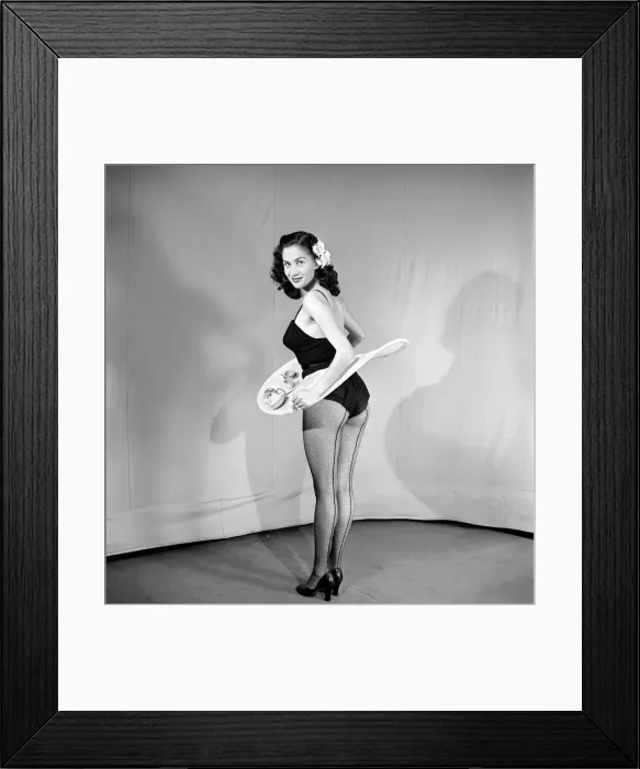 Framed Print : Tea for two: Woman wearing tea cup skirt. 1959 E38 Framed Print : Tea for two: Woman wearing tea cup skirt. 1959 E38