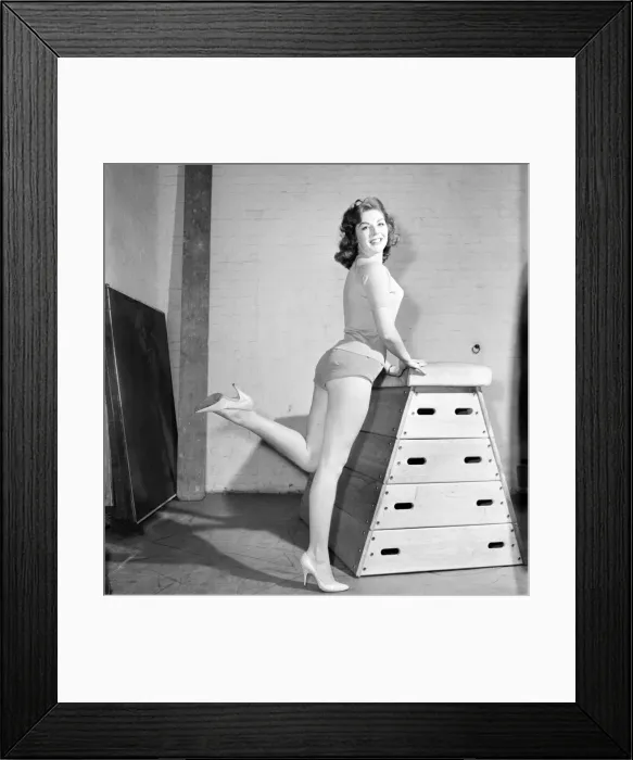 Framed Print : Jean Ryder seen here exercising on a wooden horse. 1959 Framed Print : Jean Ryder seen here exercising on a wooden horse. 1959