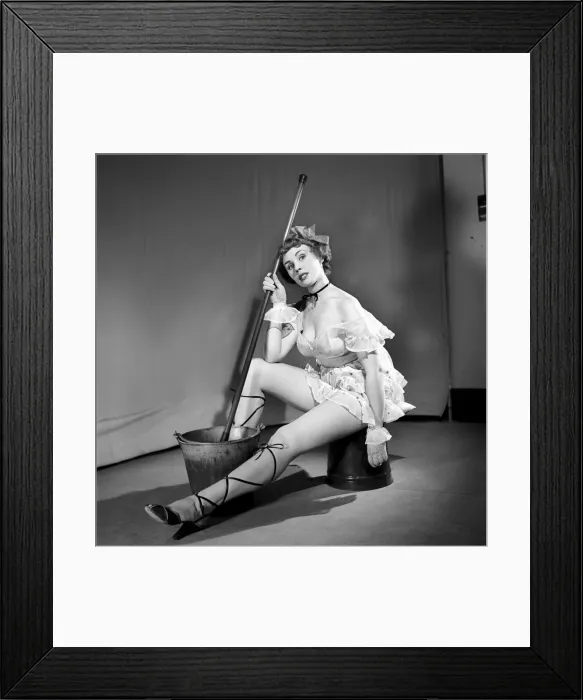 Framed Print : Cleaner wearing fancy dress. 1966 E25-009