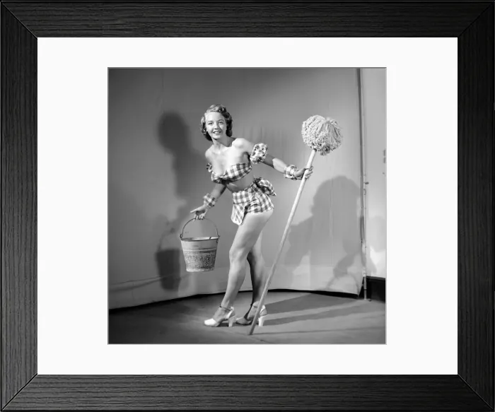 Framed Print : Cleaner wearing fancy dress. 1966 E25