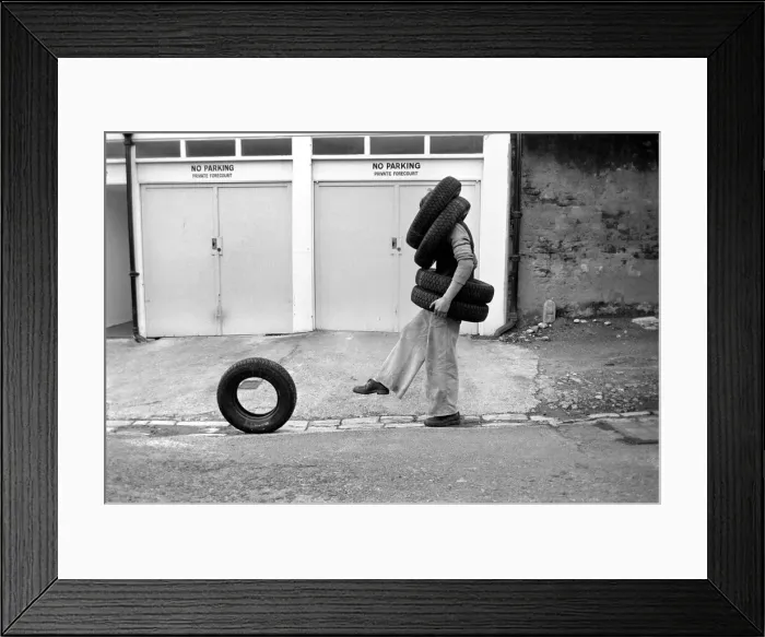 Framed Print : Unusual / Man / Tyres / Humour / Comedy. All Tyred up Brighton Tyre Fitter Framed Print : Unusual / Man / Tyres / Humour / Comedy. All Tyred up Brighton Tyre Fitter
