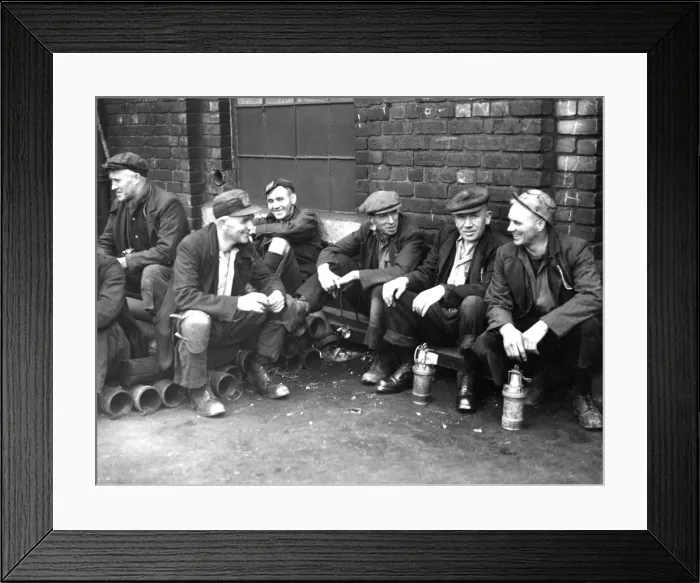 Framed Print : Its almost 10 a. m. and the day shift men enjoy a last smoke Framed Print : Its almost 10 a. m. and the day shift men enjoy a last smoke