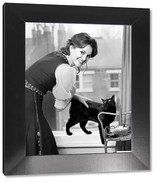 Healers Feature: Anna MaCloud: Woman with cat. February 1975 75-00711-004