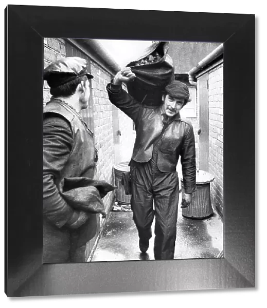 A coalman delivering coal. 27th January 1972