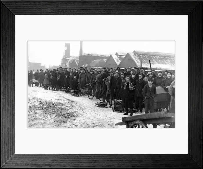 Framed Print : With sledges, prams and barrows a daily queue forms at the Redheugh Gasworks for coke Framed Print : With sledges, prams and barrows a daily queue forms at the Redheugh Gasworks for coke
