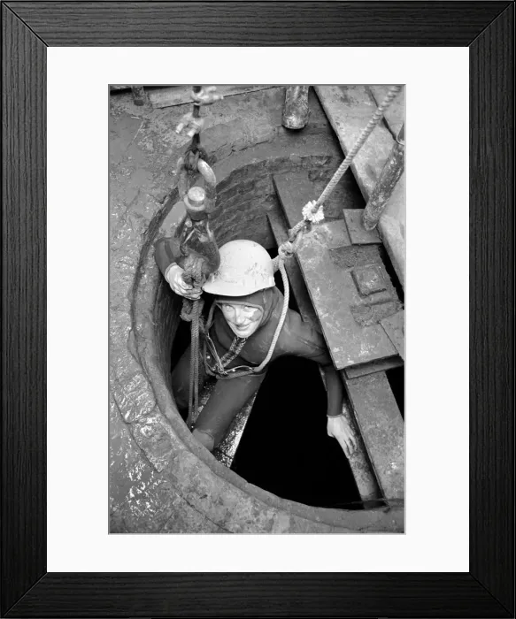 Framed Print : Well diver, Sally Manson. February 1975 75-00667-001 Framed Print : Well diver, Sally Manson. February 1975 75-00667-001