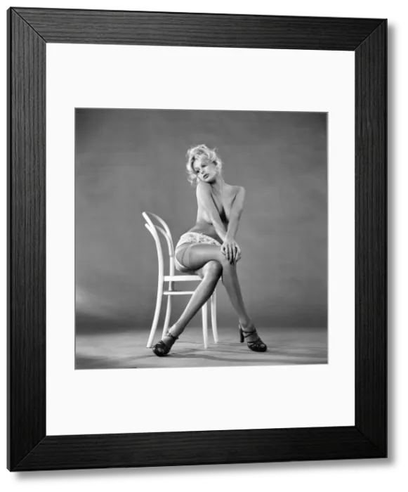 Framed Print : Glamour. Stocking Fashion. Jilly Johnson. February 1975 75-00713-001