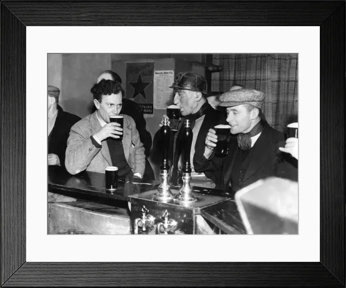 Framed Print : These miners relaxing after a hard day at work in their local working mens club