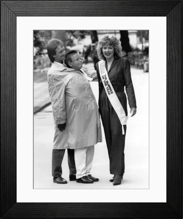 Framed Print : Husband Ian and son Daniel, 14 in Gails old coat, with the new slim Gail Escott Framed Print : Husband Ian and son Daniel, 14 in Gails old coat, with the new slim Gail Escott