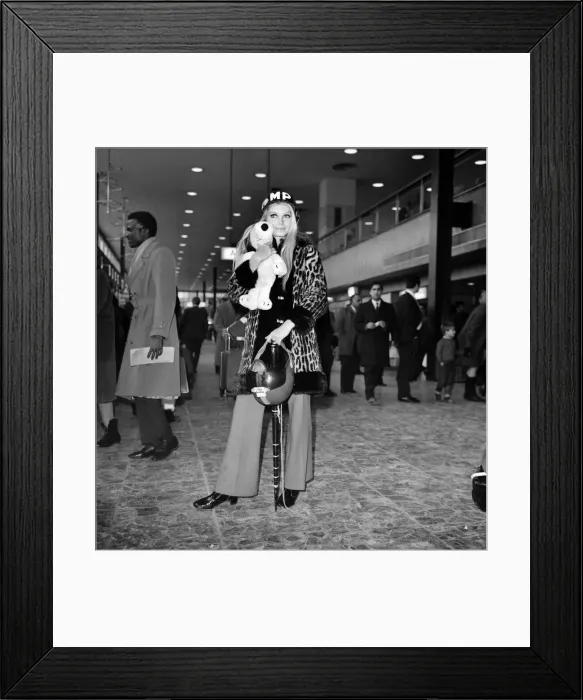 Framed Print : Miss World, Eva Rueber-Staier wearing the U. S. helmet pictured at Heathrow