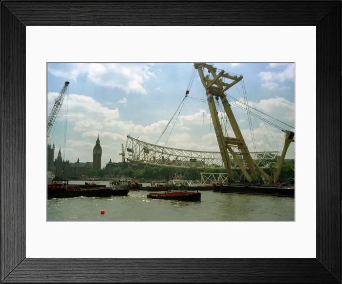 Framed Print : London Eye Wheel Construction work June 1999. First section is put in place Framed Print : London Eye Wheel Construction work June 1999. First section is put in place