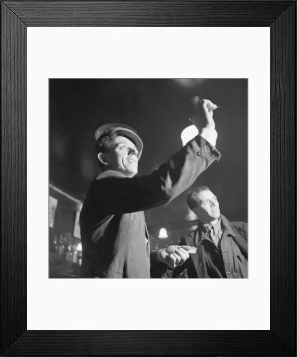 Framed Print : Glenlivet Distillery worker relax with a game of darts in a Rothes pub. Circa 1948 Framed Print : Glenlivet Distillery worker relax with a game of darts in a Rothes pub. Circa 1948