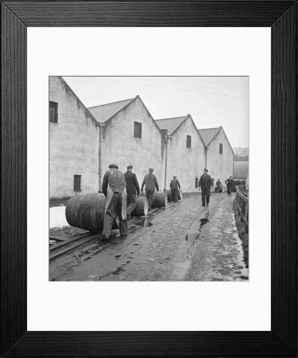 Framed Print : Glen Grant Distillery, Rothes. Re-constructed sherry barrels are rolled from Framed Print : Glen Grant Distillery, Rothes. Re-constructed sherry barrels are rolled from