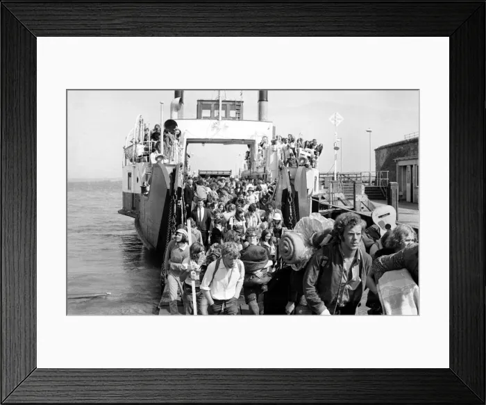 Framed Print : Pop fans leaving the ferry on arrival at The Isle of Wight. 28th August 1970 Framed Print : Pop fans leaving the ferry on arrival at The Isle of Wight. 28th August 1970