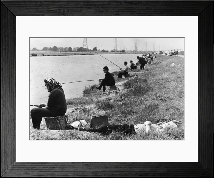 Framed Print : Womens angling competiton July 1966 Her husband catches up on 40 winks as his Framed Print : Womens angling competiton July 1966 Her husband catches up on 40 winks as his