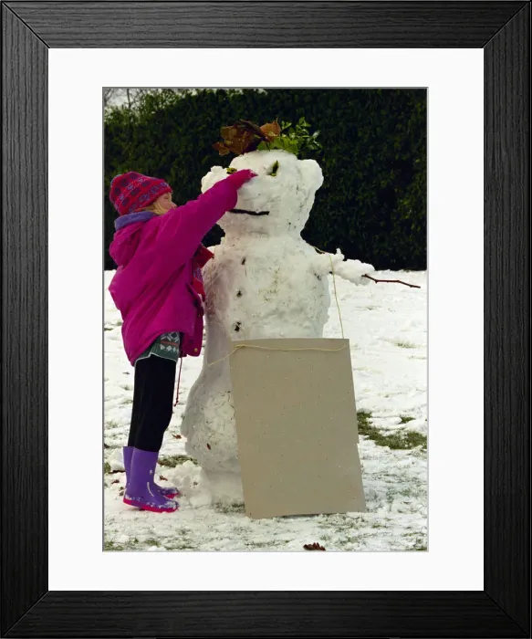 Framed Print : Snowman and his creator at Alexander Palace, London. November 1993 Framed Print : Snowman and his creator at Alexander Palace, London. November 1993