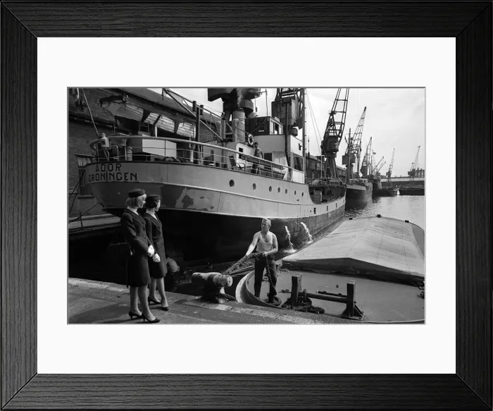 Framed Print : Port of London Dock Guides, June 1965. Two of the guides talk with a boatman Framed Print : Port of London Dock Guides, June 1965. Two of the guides talk with a boatman