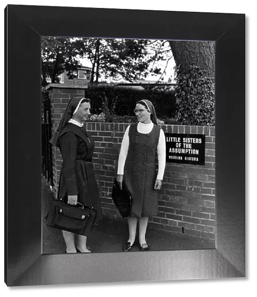 Nuns - Photo call for two short-skirted Little Sisters of the Assumption