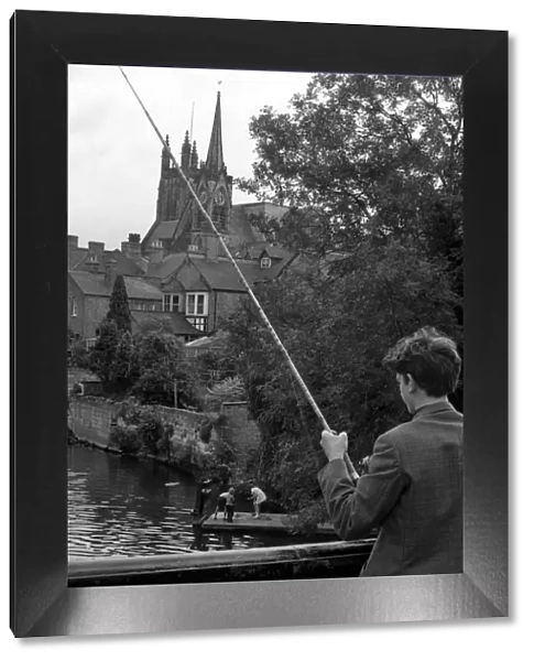 Angling. Young boy fishing in the River Leam at Leamington. 1st September 1970