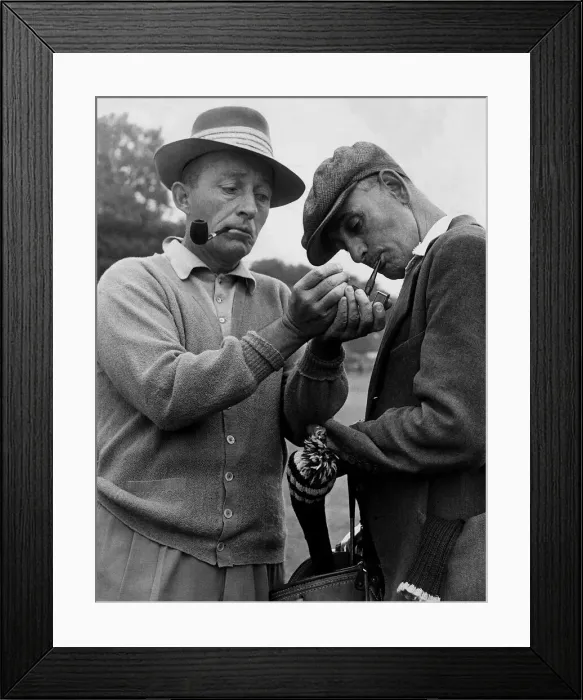 Framed Print : Bing Crosby and caddie break for a smoke during golf 1952 Framed Print : Bing Crosby and caddie break for a smoke during golf 1952