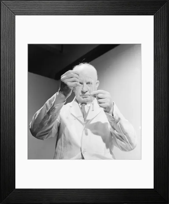 Framed Print : Scientist carrying out an experiment. April 1959 Framed Print : Scientist carrying out an experiment. April 1959