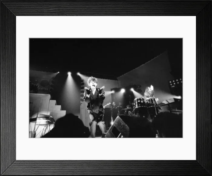 Framed Print : British pop group The Thompson Twins performing on stage during a concert in Oxford