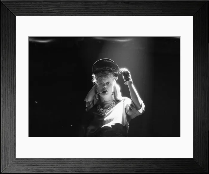 Framed Print : Alannah Currie of the British pop group The Thompson Twins performing on stage during a Framed Print : Alannah Currie of the British pop group The Thompson Twins performing on stage during a