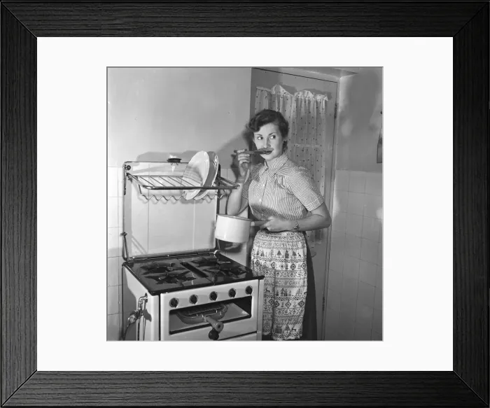 Framed Print : Woman in kitchen. Circa 1952 Framed Print : Woman in kitchen. Circa 1952