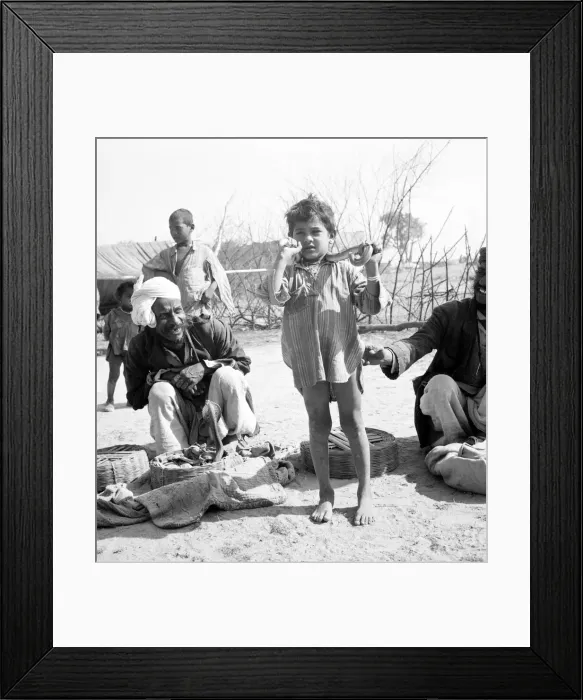 Framed Print : Snake charmer with his son in the market at Poonah. April 1959