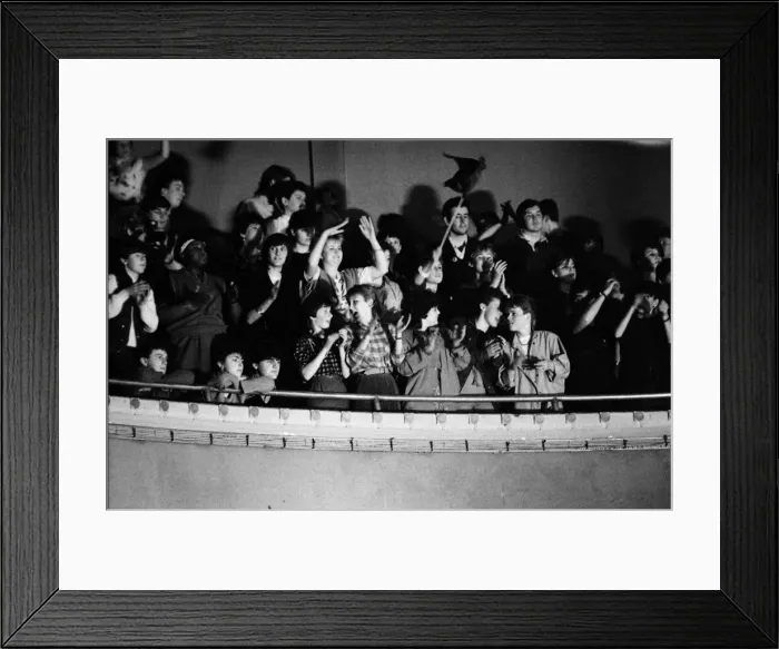 Framed Print : fans of British pop group The Thompson Twins watch them performing on stage during a
