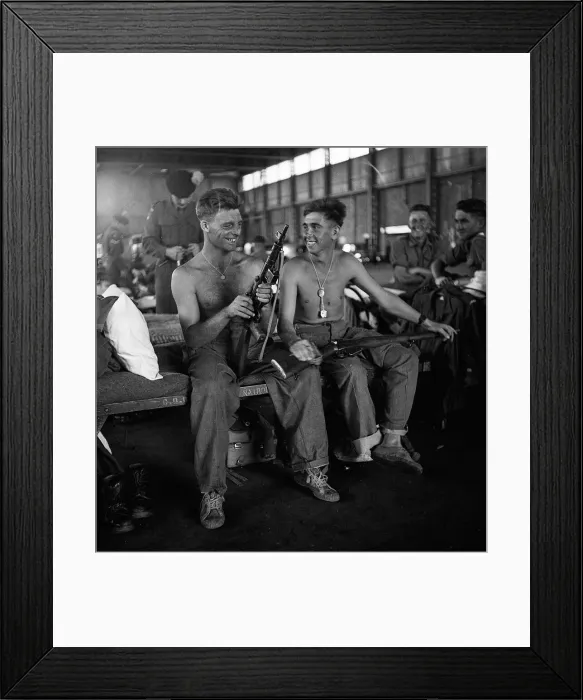 Framed Print : Men of the Lancashire Fusiliers camped in a hanger in Nairobi clean their weapons Framed Print : Men of the Lancashire Fusiliers camped in a hanger in Nairobi clean their weapons