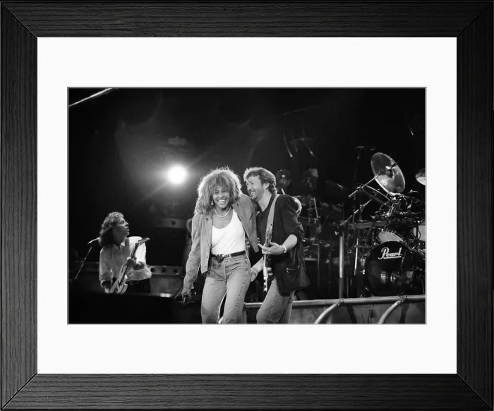 Framed Print : Eric Clapton in concert with American singer Tina Turner June 1987 Framed Print : Eric Clapton in concert with American singer Tina Turner June 1987