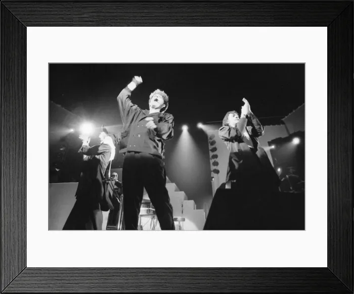 Framed Print : British pop group The Thompson Twins performing on stage during a concert in Oxford Framed Print : British pop group The Thompson Twins performing on stage during a concert in Oxford