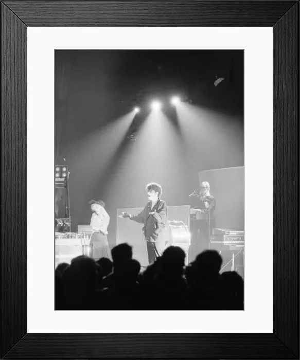 Framed Print : Tom Bailey and Alannah Currie of the British pop group The Thompson Twins performing Framed Print : Tom Bailey and Alannah Currie of the British pop group The Thompson Twins performing