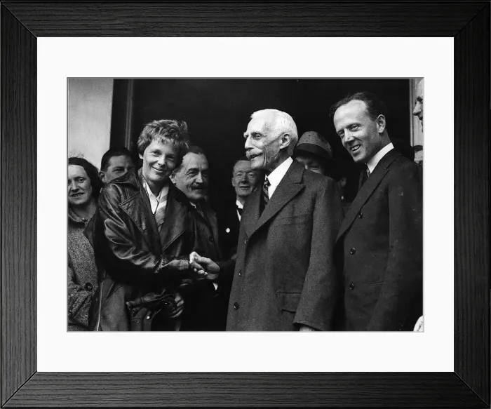 Framed Print : Amelia Earhart airwoman shaking hands with the American Ambassador Framed Print : Amelia Earhart airwoman shaking hands with the American Ambassador