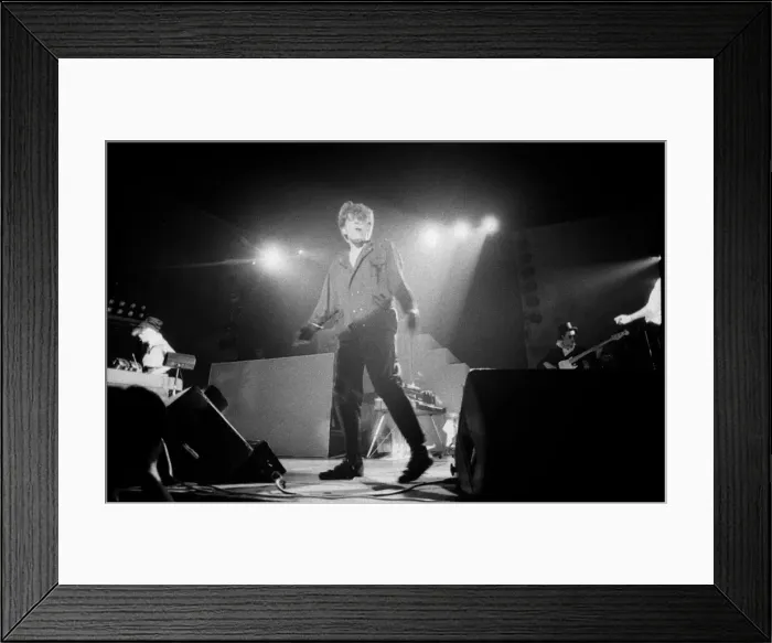 Framed Print : Tom Bailey of the British pop group The Thompson Twins performing on stage during a Framed Print : Tom Bailey of the British pop group The Thompson Twins performing on stage during a