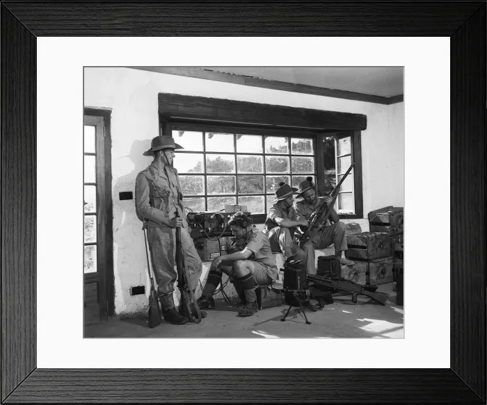 Framed Print : Four Army men belonging to the Kenya Reserves in a command post up country